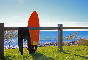 Surfboard and wetsuit at Sunshine Coast Australia
