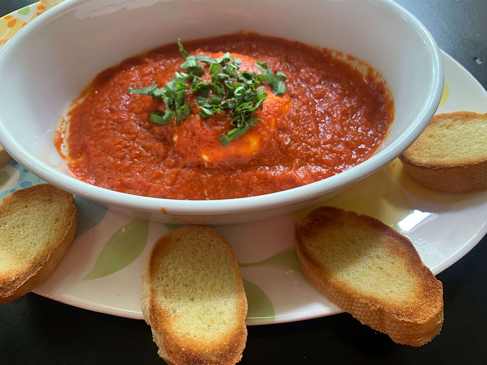 Crostini with Goat Cheese Round and Tomato-Basil Sauce