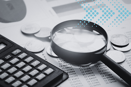 magnifying glass, calculator, coins, financial paperwork