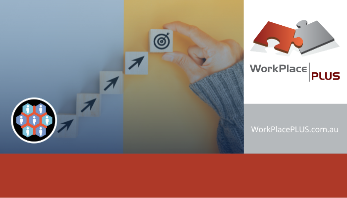 Hand in sweater arranges blocks with arrows and a target icon on blue and yellow background. Text: "WorkPlace PLUS," puzzle logo, website link.