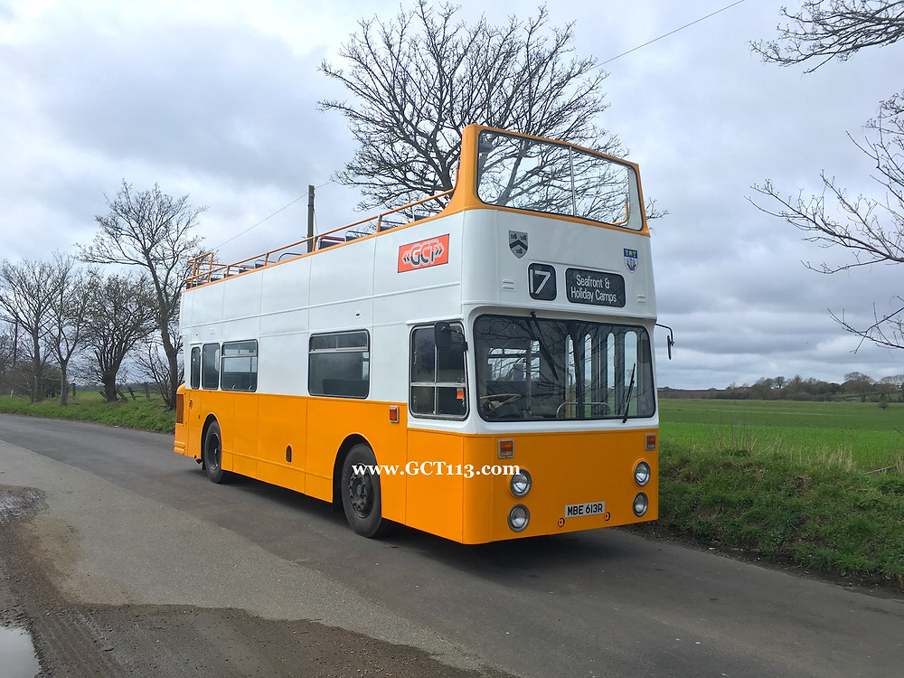 The contrast in orange between the stylised GCT fleet name sticker above the driver's cab and the orange paint can be seen here.