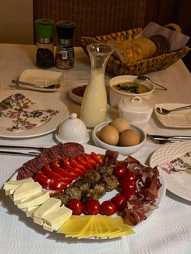 Platter of sausages, cheese and tomatoes