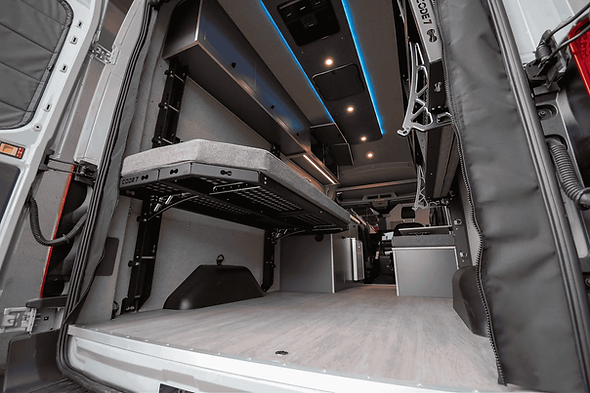 Ford Transit camper van with adjustable folding bed by Paradigm Van Conversions