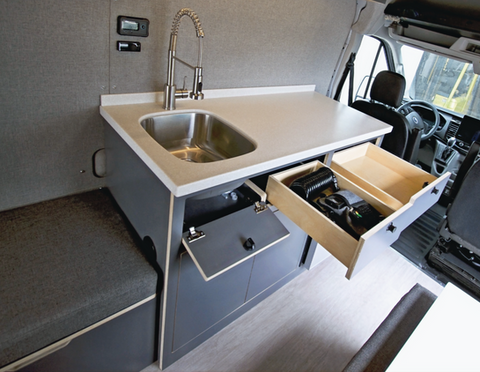Camper van kitchen setup, van water systems, practical kitchen layouts for vans.