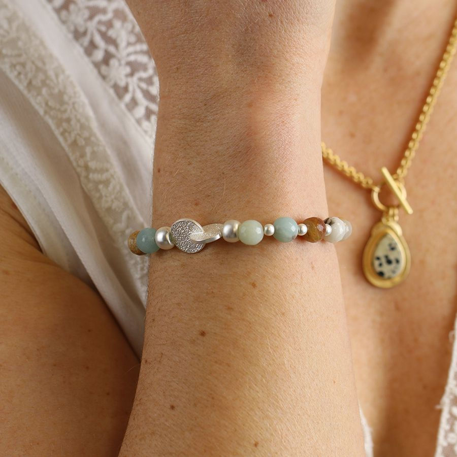 Thumbnail: Pale natural stone bracelet with connected silver plated discs