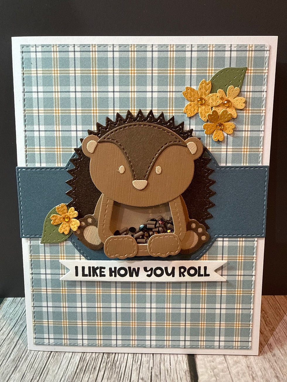 Blue plaid background with die cut porcupine