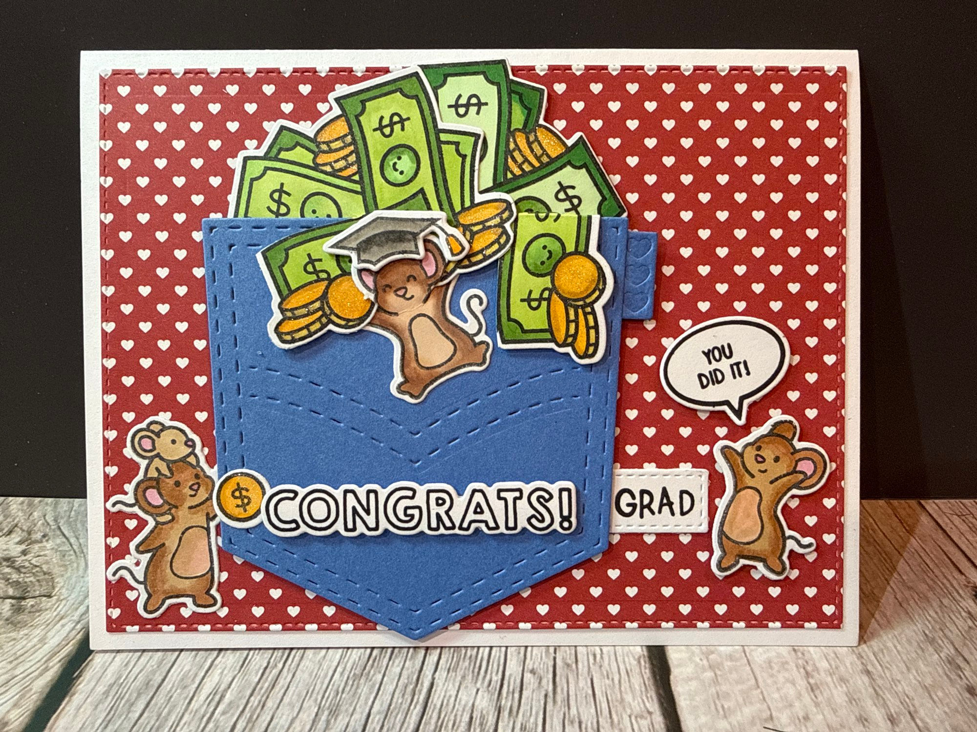 Graduation card with mice, money, "CONGRATS! GRAD YOU DID IT!".