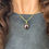 Thumbnail: Bezel set garnet cabochon pendant