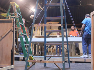 Coffee, donuts, electric drills, ladders - it's Saturday at the theater...