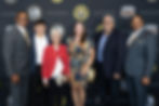 Luis Clemente and Roberto Clemente Jr. posing with guests at the Roberto Clemente Foundation Ambassador's Reception 2026 Pittsburgh, PA venue photo