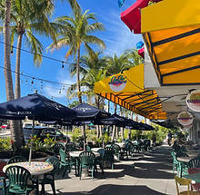 Outdoor seating at Cha Cha Coconuts in St. Armands Circle, Sarasota
