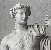 Classic sculpture in the Roman or Greek style depiciting bust of a women with decorated head piece and confident stance depicting role profiles