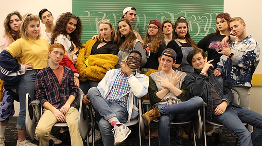 Pace University's Tonal Recall a capella poses in their 90s gear after performing.