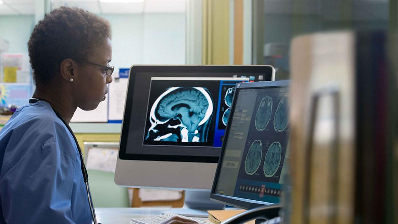 a-radiologist-busy-looking-at-some-x-rays.jpeg