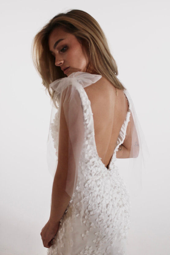A floral Fitted gown with bow detailing
