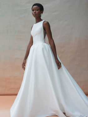 SALE DRESS - The Audrey gown is as fresh as she is classic. Featuring an elegant boat neckline, an impossibly flattering subtle drop waist, and a dramatic ball skirt, the overall effect is truly timeless. Was £2150, Now £1295-