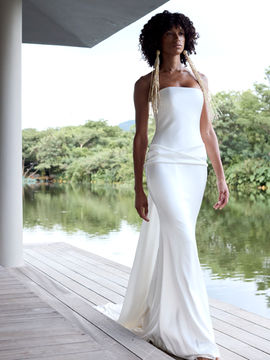 Match your mood with Sen, mastering the art of the multi look. Sen's detachable train is perfect for a high impact first look, remove the train at your reception and allow this double satin masterpiece to shine. Sen features dropped waist fit and flare gown, set apart by its drape detail at the low waist, crafted for minimalists with a maximalist lean.
