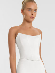 Adding fuel to your multi look fire c/o Whittaker. Cut from luminous double satin, Whittaker's scooped neckline and dipped waist is a perfect complement to the Nix skirt as a luxe first look and Marcel as a sleek second.
Paired with: Nix skirt.