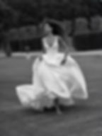 Graceful gown with modest straps and a plunging neckline. The basque waistline creates an outstanding silhouette and the layered puffy skirt balances the fitted bodice.