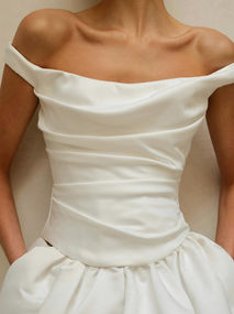 Nevada, delivering a serve of organic draping with a side of je ne sais quoi. Cut from luxe duchess satin, off shoulder Nevada corset delivers structure and effortlessness at the same time. Fastened using lace for the perfect fit, pair Nevada with the Opal skirt for a high drama aesthetic.
Styled with the Opal Skirt £3000