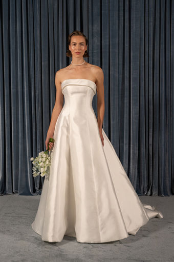 The Leah gown is as chic as she is timeless, proving the adage that less is more.