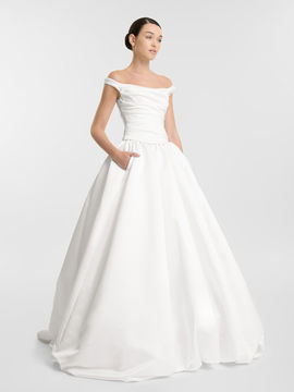 Embrace your inner whimsy in the cloud-like Opal skirt. A feat in construction, this sculptural masterpiece is adjustable in length, giving you the option to take Opal from floor length opulence, to playful knee length, to even a powder puff strapless dress. Cut from duchess satin, Opal takes this season's most sought-after on-and-beyond the runway silhouette to new couture level.
Styled with the Nevada Corset £1560