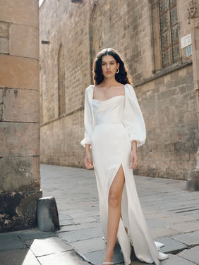 SALE DRESS - The Luciana gown evokes a feel of old Hollywood. Featuring a sultry cowl neckline and sumptuously oversized sleeves that can be worn on or off the shoulder. WAS £1795, Now £995. Perfect Condition (Discontinued Gown)
