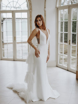 A Slim Fitted Wedding Dress in Crepe. Deep V Neckline
Style with the Odile Veil £300