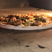 Lapiazza cooking pizza.jpeg