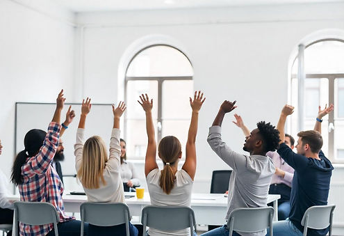 freepik__a-group-of-diverse-people-raising-their-hands-in-a__61382.jpeg