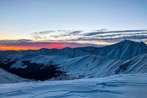Sunrise over the Colorado mountains from Mount Sniktau