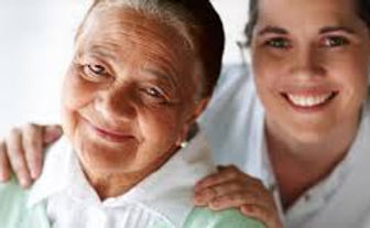 Volunteer visiting elderly client