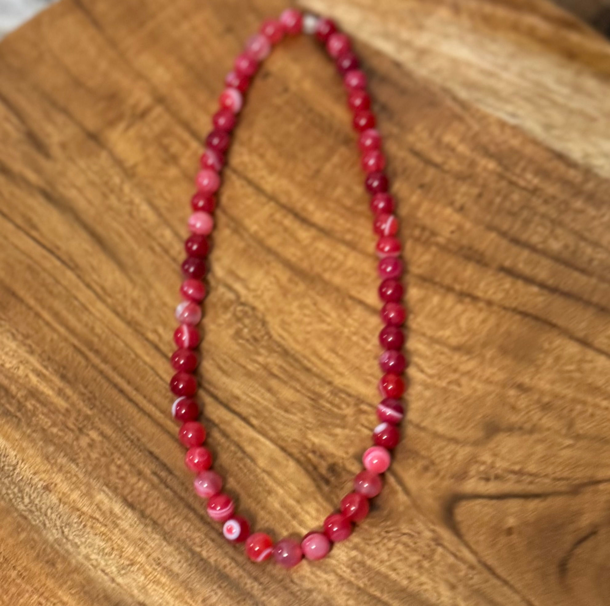 Necklace with hot pink beads