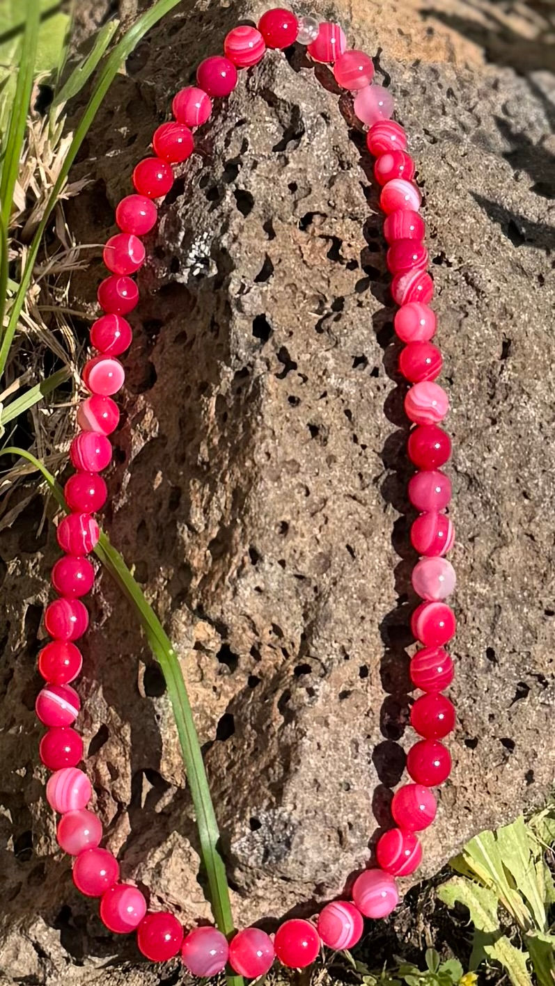 Necklace with hot pink beads