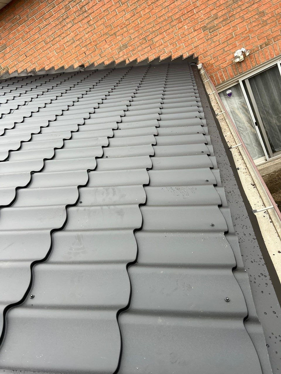 Monterey metal tile roofing profile used for Ontario homes