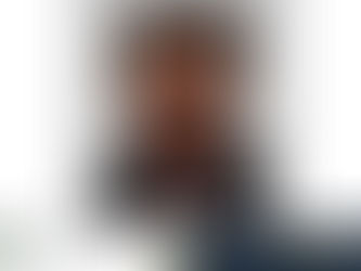 Police hunt man who raped a teenager waiting for a minicab