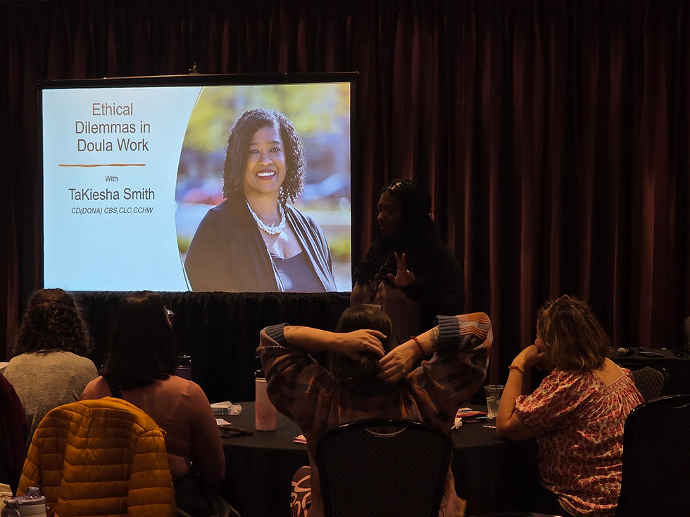 Audience watching owner TaKiesha's presentation: 'Ethical Dilemmas in Doula Work'