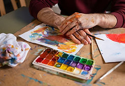 male-painter-using-watercolor-his-art-studio (1).jpg