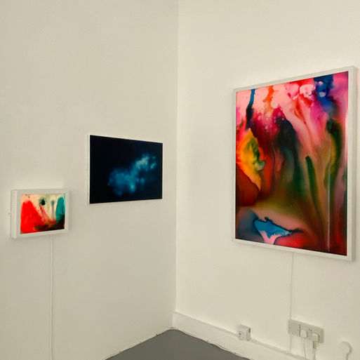 glass paintings, abstract art, painting on glass, chemicals on glass, back lit, 