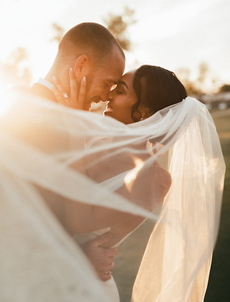 Newly married couple celebrating their strong relationship. Make the feelings of love and excitement last forever with skills learned in premarital counseling in Denver. Red more here.