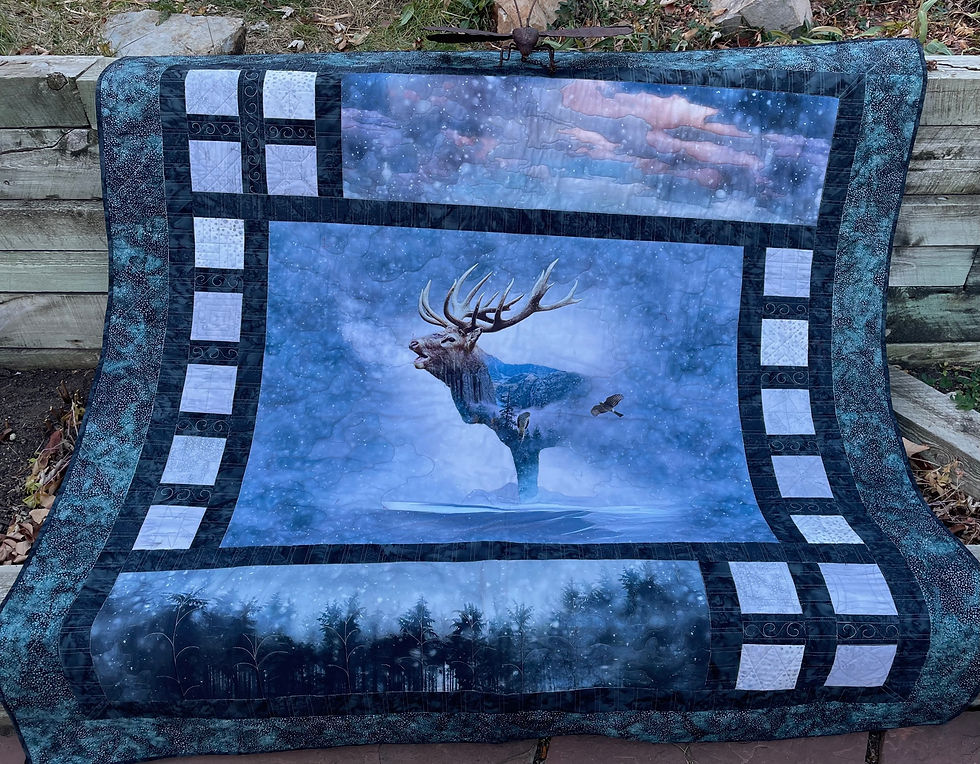 Thumbnail: Triptych, a panel quilt that allows for both vertical and horizontal panels with Hoffman Call of the Wild Elk fabric