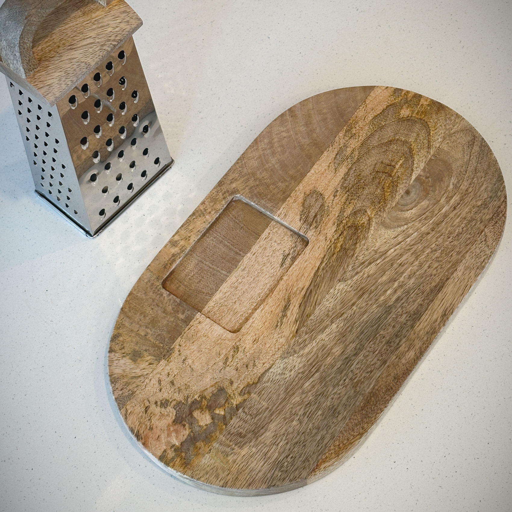 Artisanal wood and stainless steel grater