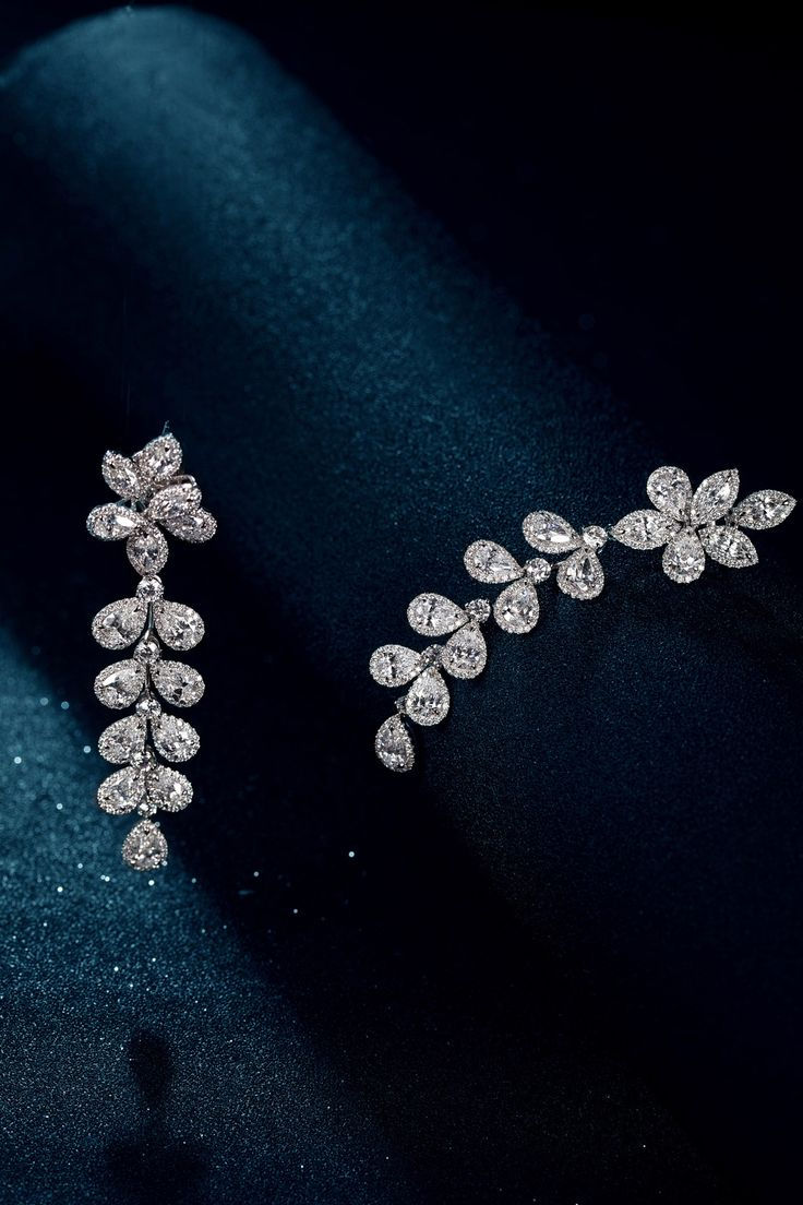 Diamond dangle earrings shaped like an olive branch, perfect for daily wear personalised jewellery.
