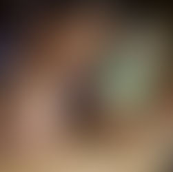 Parent guiding young child with warmth and attention while they explore and learn together