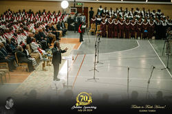 Yonas Gorfe conducting the Hibret Choir and orchestra