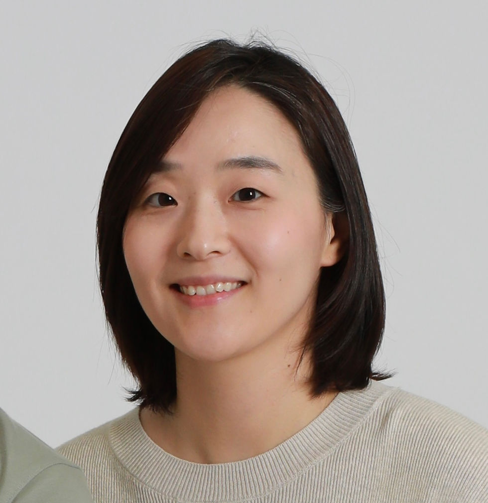 Portrait of a woman smiling at the camera, director of Studio Norii.