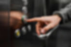 delivery-man-with-package-elevator-close-up (1).jpg