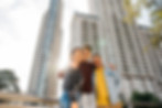 multiracial-young-friends-standing-against-city-buildings.jpg