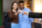 front-view-couple-receiving-keys.jpg