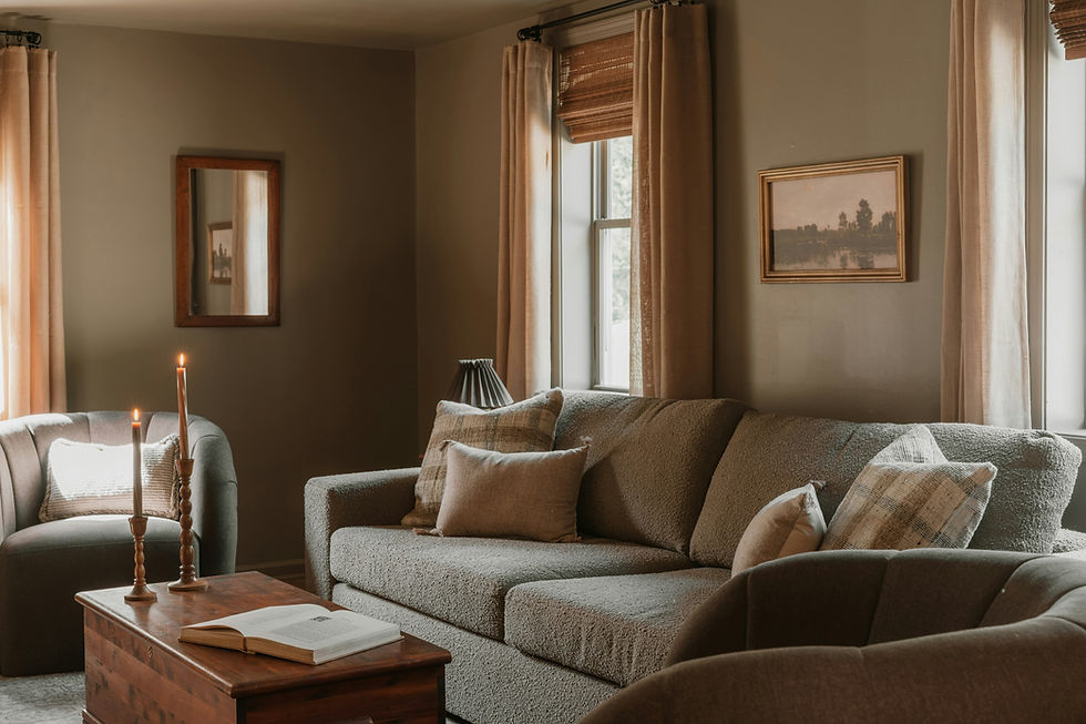 Calm, well‑maintained living room with natural light, representing housing stability and tenancy retention in community and NDIS housing.